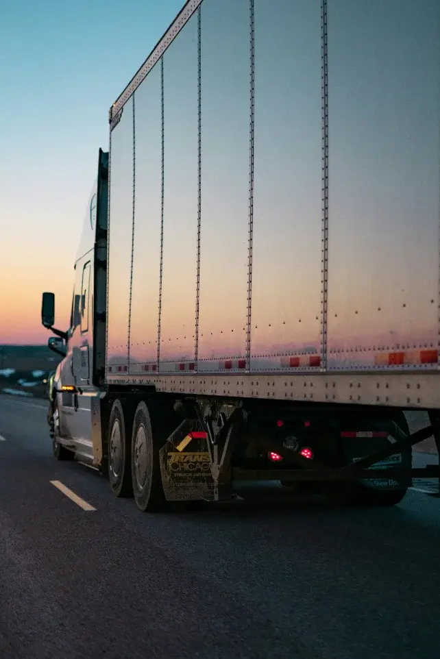 The JD Carriers truck loading cargo