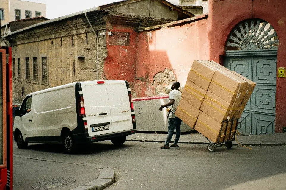 A two-person crew handling a delivery